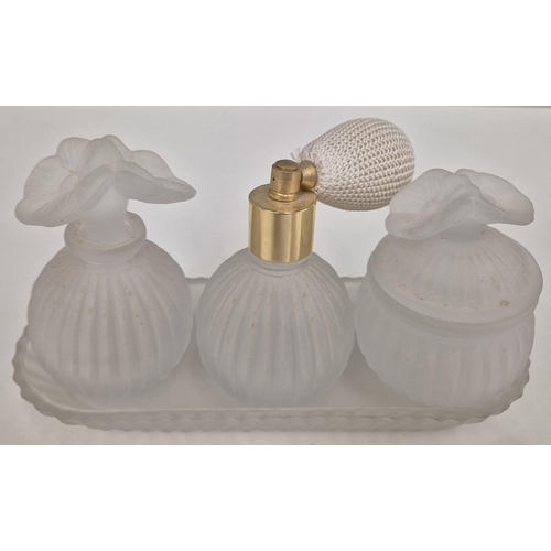 5225 - A mixed lot of vintage, decorative glass items. To include two Egyptian perfume bottles, vanity set,... 