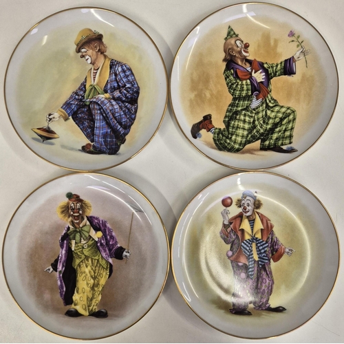 5235 - A set of four vintage, German Gloria clown plates.
