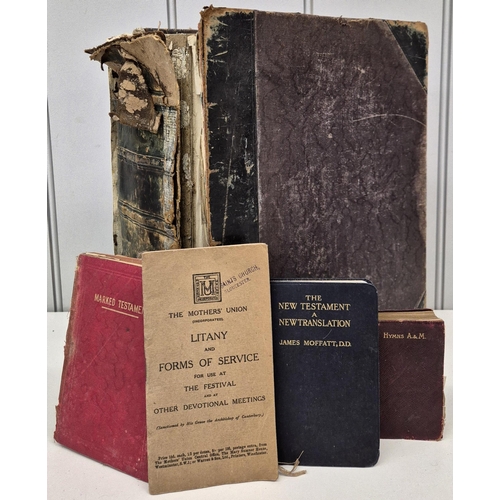 4822 - A large Victorian family bible, together with a collection of 4 religious books. A/F condition.