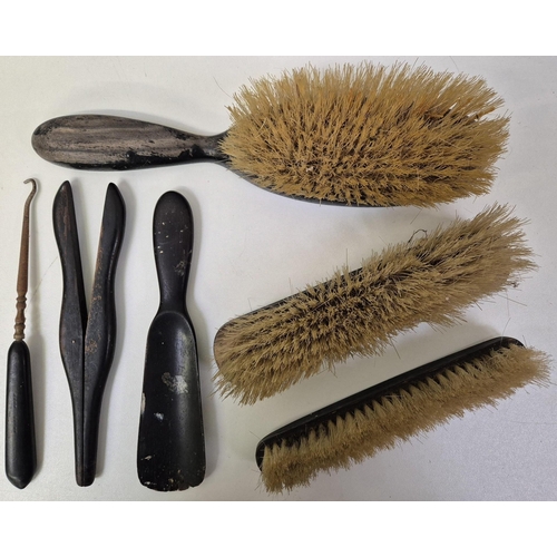 4826 - A collection of vintage, ebony dressing table items. To include clothes brushes, glove stretcher, et... 