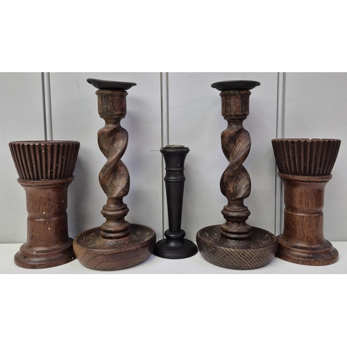 4827 - A collection of vintage treen. To include candlesticks, fine box, etc. Tallest 21cm.