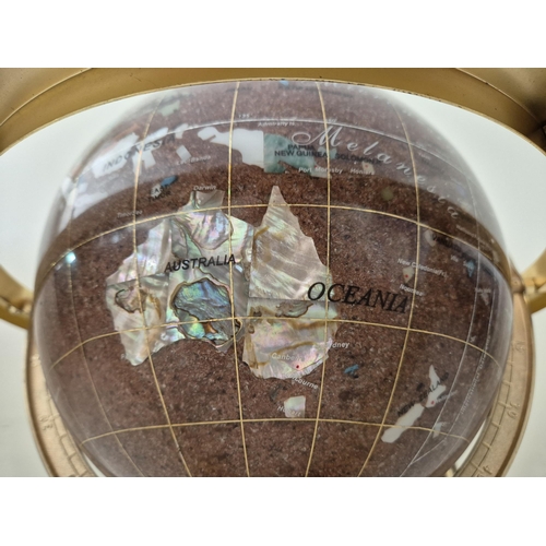 4834 - A rotating 'Gemstone Globe'. Countries depicted by semi-precious gemstones. Height 33cm, diameter 31... 