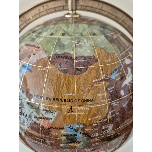 4834 - A rotating 'Gemstone Globe'. Countries depicted by semi-precious gemstones. Height 33cm, diameter 31... 