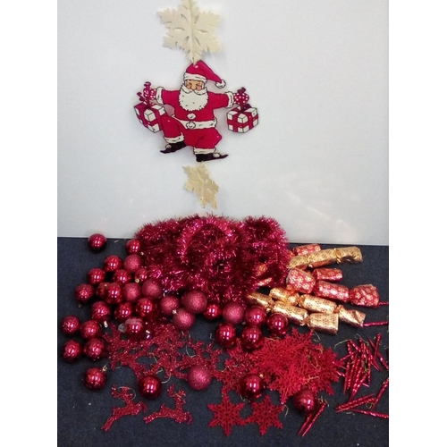 4840 - A selection of Christmas decorations. To include small tree, tinsel, Mother Christmas shawl, etc.