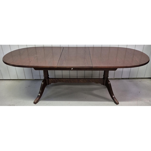 4852 - A vintage, walnut finish extending dining table, with six matching ladderback chairs. Table dimensio... 