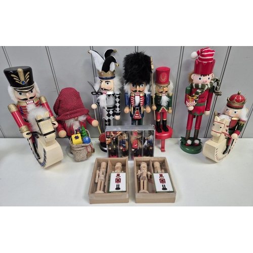 4862 - A collection of 7 larger Nutcracker figures, a set of four & two pairs of unpainted figures. Tallest... 