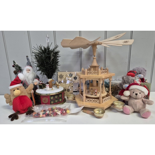 4866 - A quantity of Christmas items. To include  an advent calendar tree, soft toys, wooden windmill scene... 