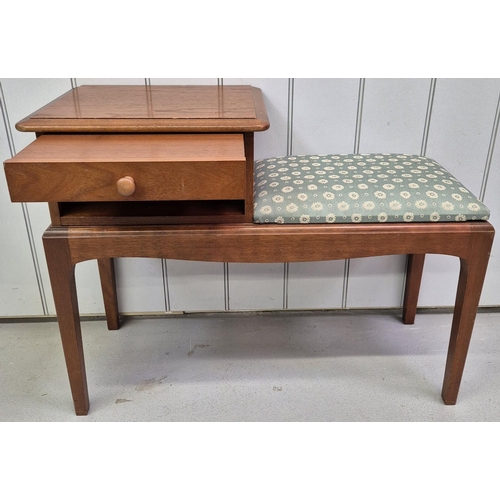 4873 - A mid-century teak telephone table. Dimensions(cm) H61, W79, D30.