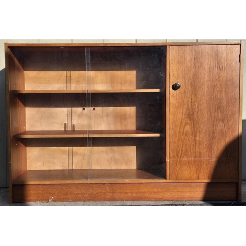 4932 - A part-glazed, mid-century teak bookcase, by 'Remploy'. Dimensions(cm) H84, W122, D30.