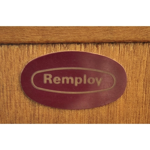 4932 - A part-glazed, mid-century teak bookcase, by 'Remploy'. Dimensions(cm) H84, W122, D30.