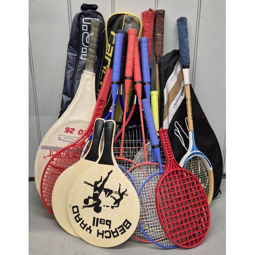 4937 - A collection of sports rackets. To include Slazenger, Dunlop, Cobra, Interclub, etc.