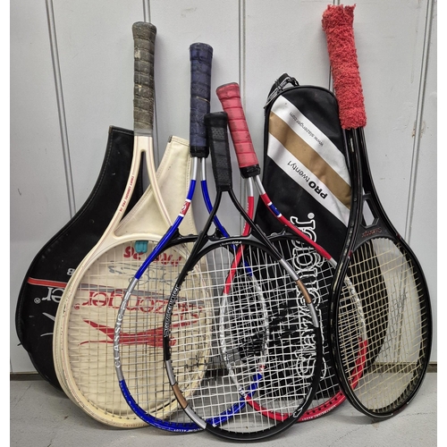 4937 - A collection of sports rackets. To include Slazenger, Dunlop, Cobra, Interclub, etc.