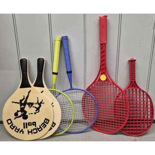 4937 - A collection of sports rackets. To include Slazenger, Dunlop, Cobra, Interclub, etc.