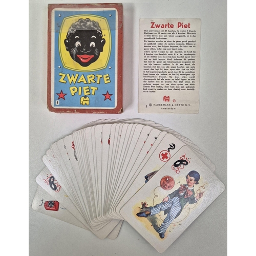 4948 - Vintage darts sets & flights, together with a mid-century 'Zwarte Piet' card game, by Jumbo.