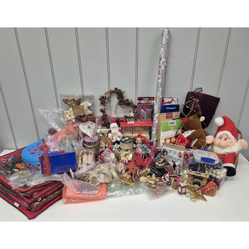 5902 - A large selection of new(mostly) Christmas items. To include sacks, baubles, wrapping, bows, etc.