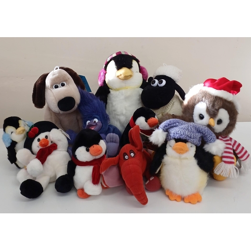 5838 - A collection of 11 Christmas soft toys.