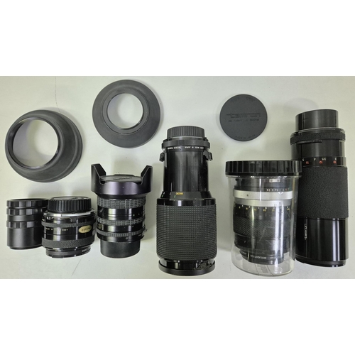 5975 - A professional Nikon F2 35mm SLR camera, with a huge range of accessories, to include six lenses, fl... 