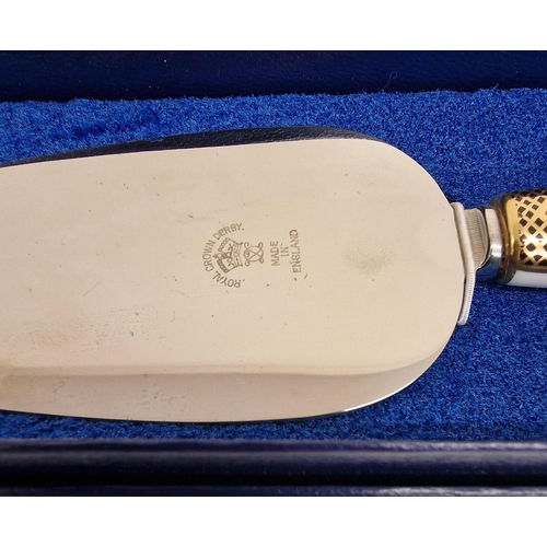 5881 - A boxed Royal Crown Derby cake slice, together with a King George VI souvenir coronation spoon.