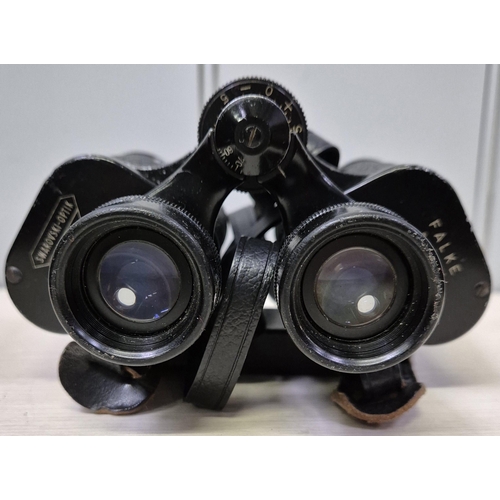 5903 - A pair of vintage Swarovski-Optik Tirol Falke 8x30 binoculars, with original leather case.