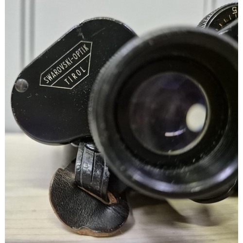 5903 - A pair of vintage Swarovski-Optik Tirol Falke 8x30 binoculars, with original leather case.