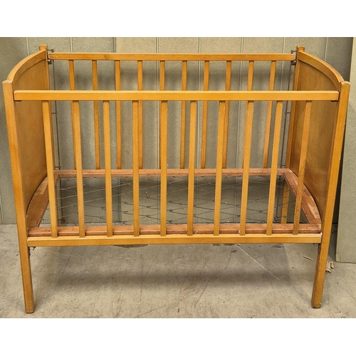 6236 - A mid-century child's cot. Dimensions(cm) H98, W122, D61.