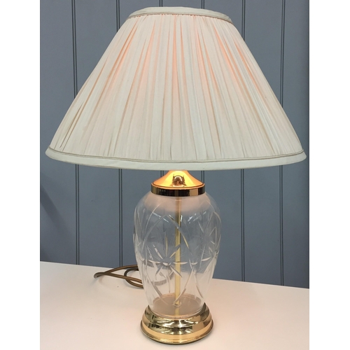 6243 - A cut-glass table lamp with cream pleated shade. PAT test pass & functionality test indicates in wor... 