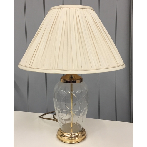 6243 - A cut-glass table lamp with cream pleated shade. PAT test pass & functionality test indicates in wor... 