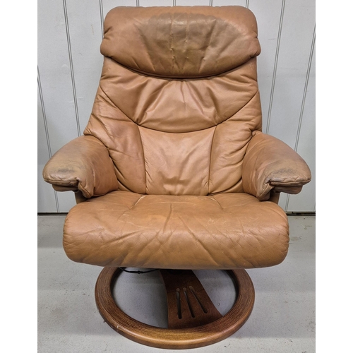 6325 - A Swedish leather stressless chair & matching footstool, by Anderssons. Respective dimensions(cm) H9... 