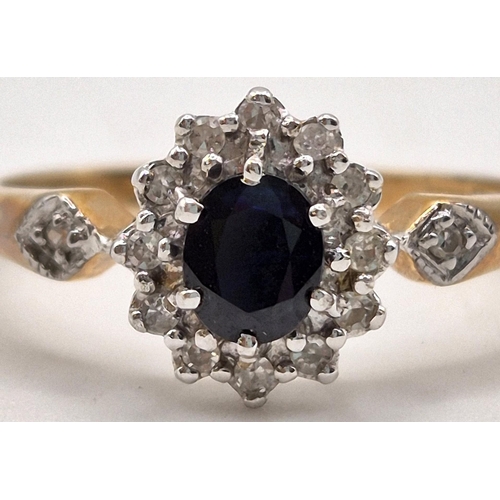 6337 - A hallmarked 9ct gold & sapphire, diamond engagement ring. Size L.