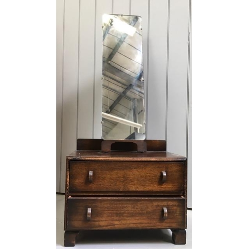 6360 - An Edwardian dressing chest of two drawers. Tilt mirror will require two threaded fittings to re-att... 