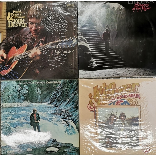 3265 - A collection of four vinyl albums, by 'John Denver'. To include 'Back Home Again', 'Poems, Prayers &... 