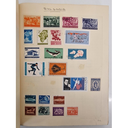 4806 - A vintage stamp album, containing a good quantity of worldwide stamps.