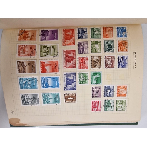 4806 - A vintage stamp album, containing a good quantity of worldwide stamps.