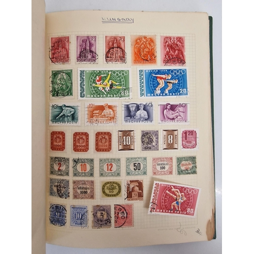 4806 - A vintage stamp album, containing a good quantity of worldwide stamps.