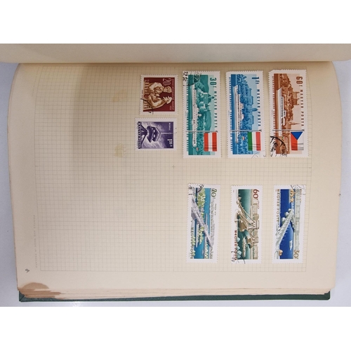 4806 - A vintage stamp album, containing a good quantity of worldwide stamps.