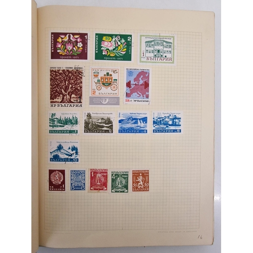 4806 - A vintage stamp album, containing a good quantity of worldwide stamps.