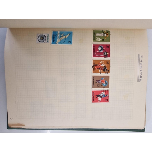 4806 - A vintage stamp album, containing a good quantity of worldwide stamps.