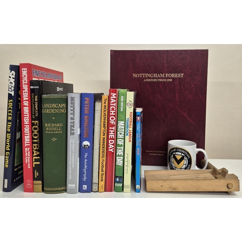 4809 - A vintage wooden football rattle, together with a collection of football-related books, mug & a land... 