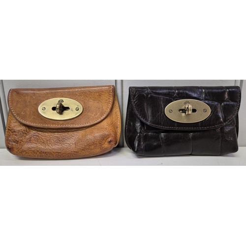 4863 - A collection of four boxed & one unboxed original Mulberry purses. Three with classic twist catches.