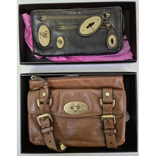 4864 - A collection of four boxed Mulberry purses, three notebooks & two straps.