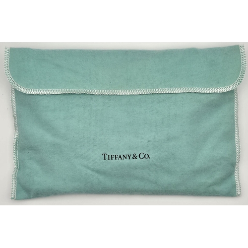 4882 - An original 'Tiffany & Co' wristlet wallet.