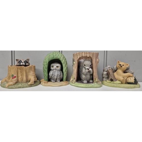 4889 - A full set of 12 Franklin Porcelain 'Woodland Surprises', by Jacqueline Smith, together with another... 