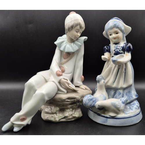 4897 - A collection of four figurines. To include Delft, NAO, Auro Belcari & another. Tallest 26cm.