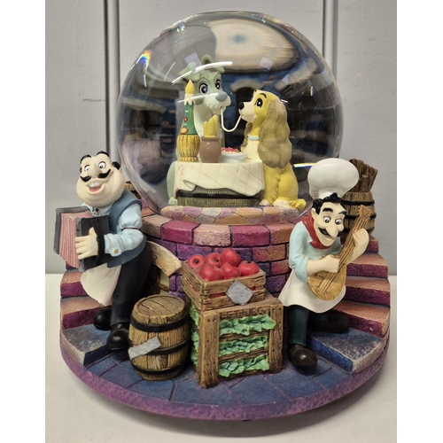 4898 - A large, musical Disney snowglobe - 'Lady & The Tramp', together with a pair of Royal Worcester Comp... 