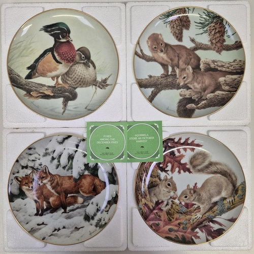 4913 - A full set of twelve, boxed 'The Forest Year' collector's plates by John Francis, for The Collectors... 