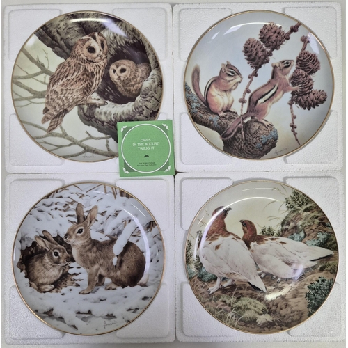 4913 - A full set of twelve, boxed 'The Forest Year' collector's plates by John Francis, for The Collectors... 