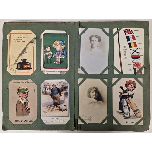 4940 - An early 20th century postcard album, with a variety of Victorian & later postcards; together with a... 