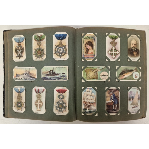 4941 - Two early 20th century cigarette card albums, together with a 1996 Wildlife & Wetlands Trust first d... 