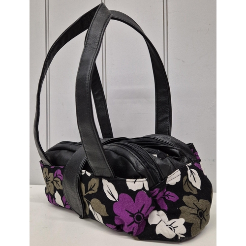 4974 - A collection of four handbags, all appear unused. To include 'Passage' & three others.