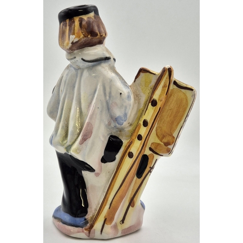 4805 - A vintage, fun, Italian 'Drioli' figurine, with lenticular design. Dimensions(cm) H13, W9, D4.5.